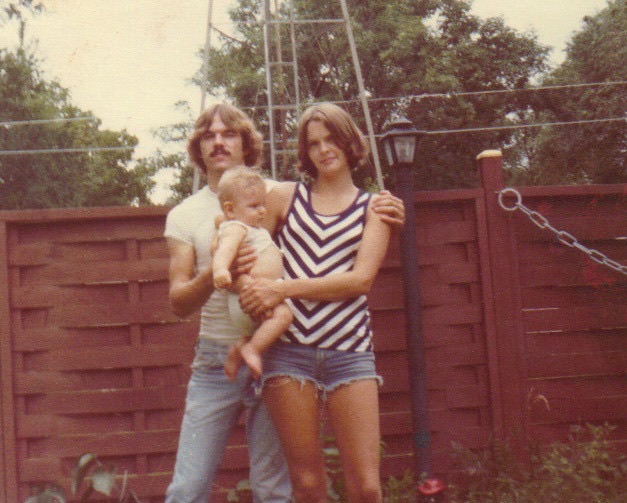 Rebecca with baby Garrett and his father, David, in early 1977