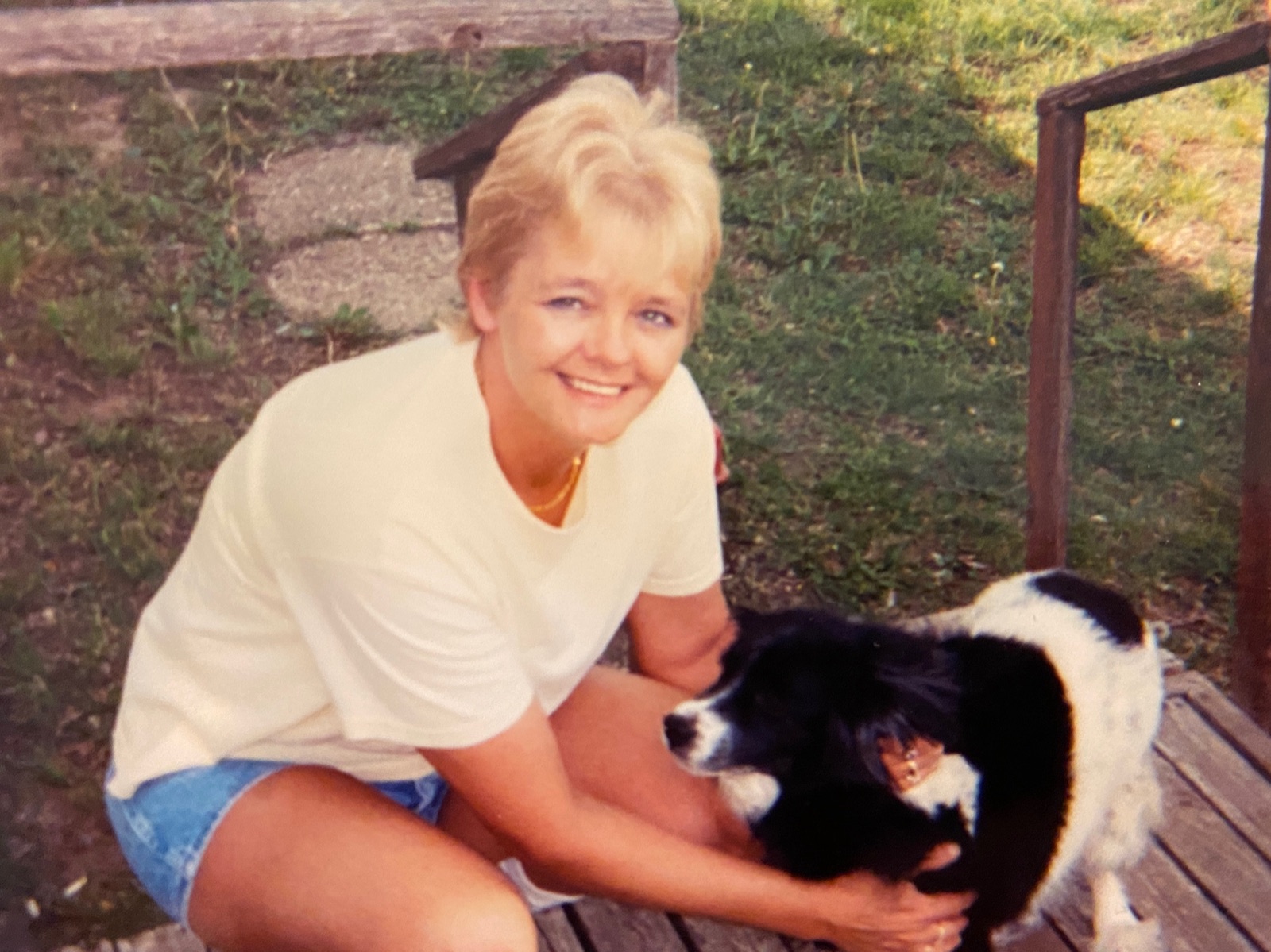 Rebecca outdoors with one of her dogs, 1990s
